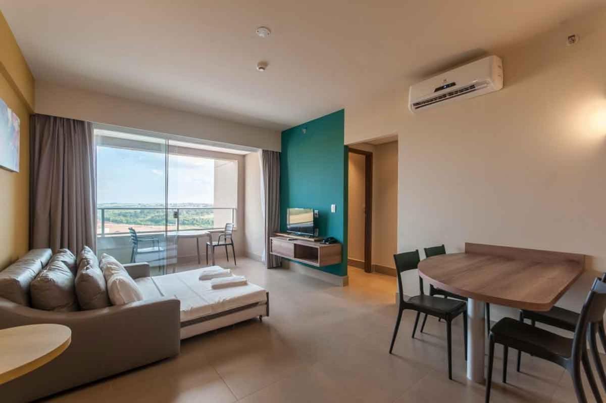 Enjoy Solar Das Aguas Park Resort โอลิมเปีย ภายนอก รูปภาพ A living room in a condominium